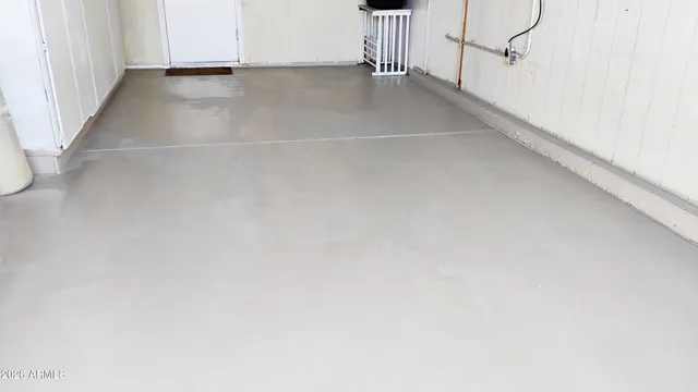 a view of a space with wooden floor