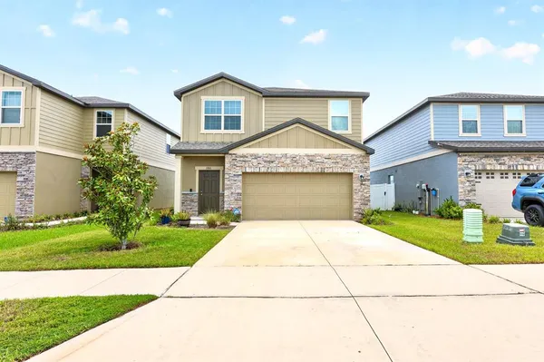 front view of house with a yard