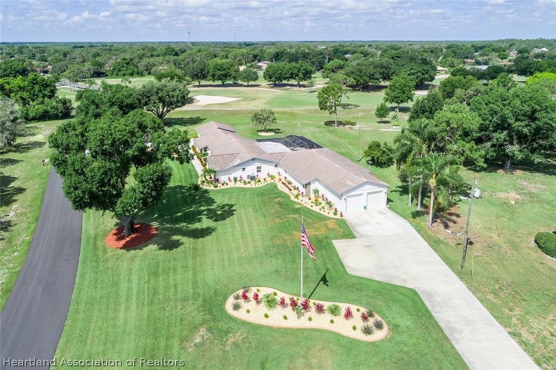 3800 Par Road Sebring, FL 33872 - Photo 24 of 24 a view of a garden with a yard