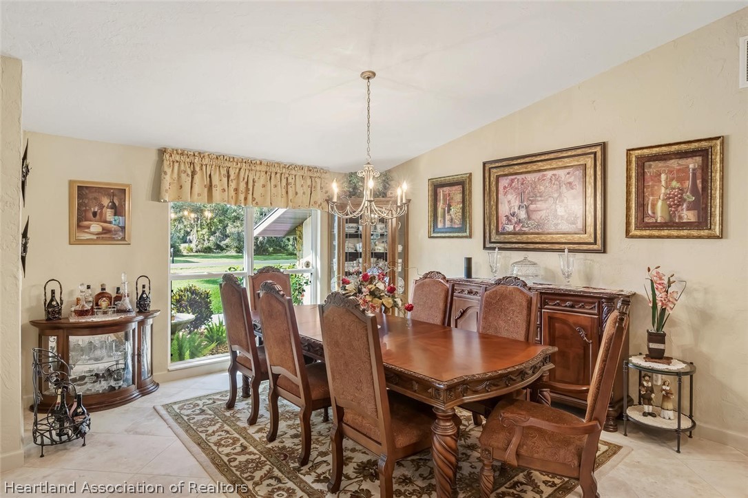 3800 Par Road Sebring, FL 33872 - Photo 7 of 24 a dining room with furniture and window