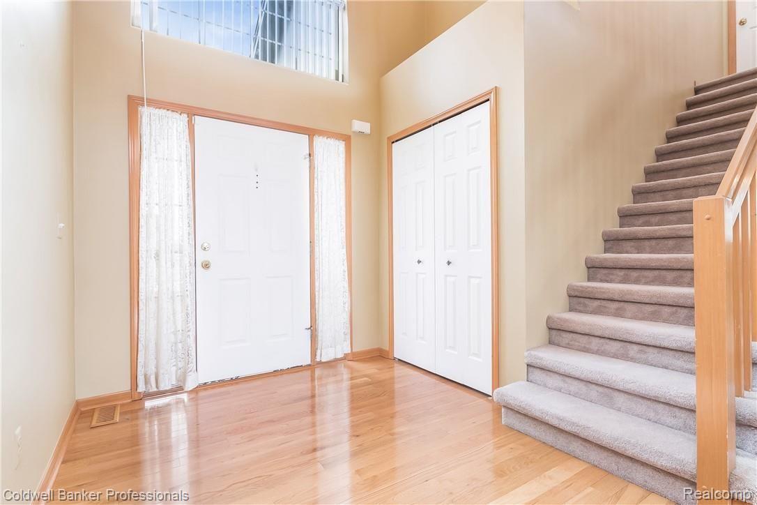 53828 Orson Road New Baltimore, MI 48047 - Photo 6 of 39 Light and bright foyer with hardwood.