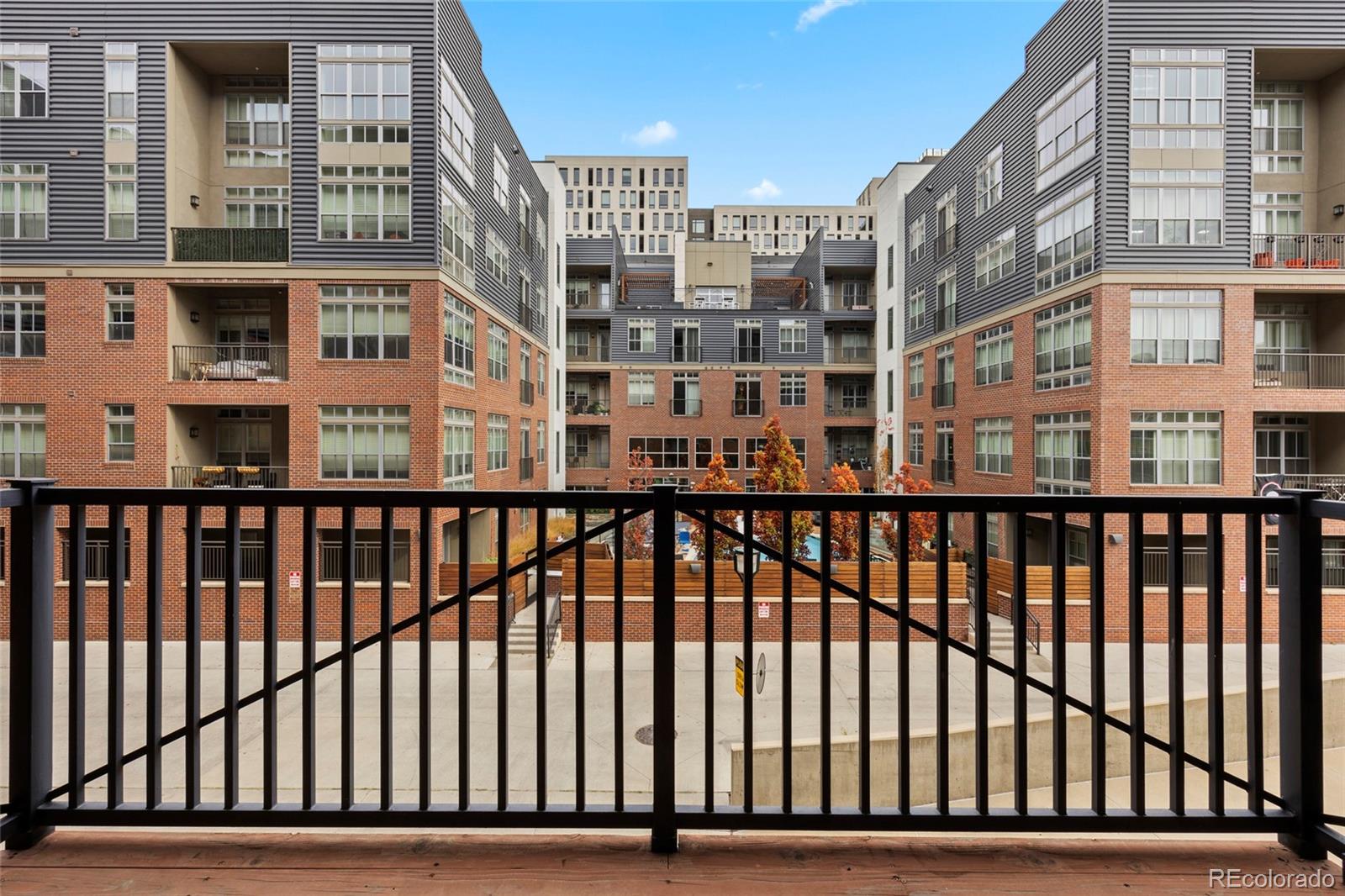 2960 Inca Street, Unit 208 Denver, CO 80202 - Photo 13 of 43 a view of a building from a balcony