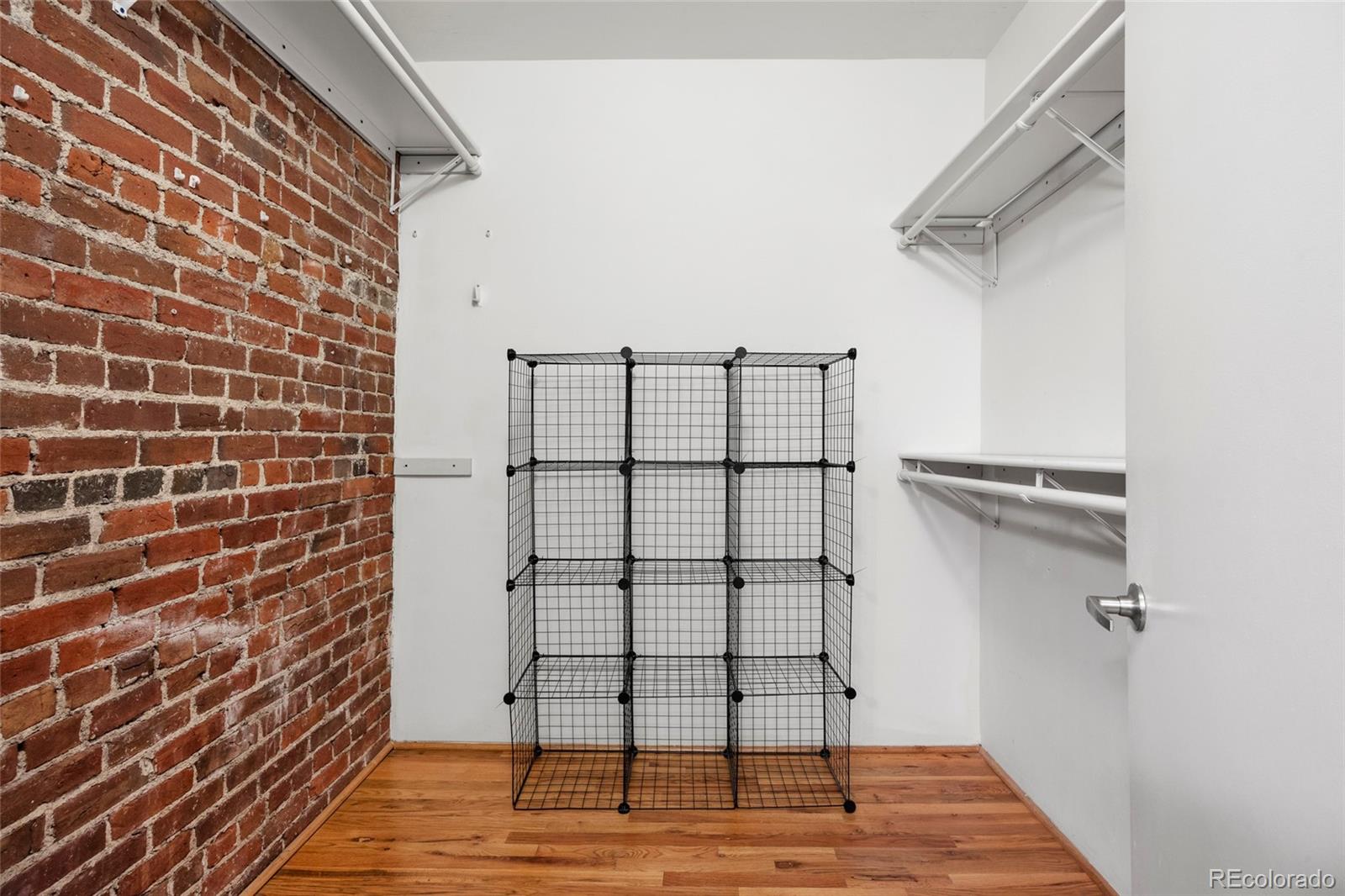 2960 Inca Street, Unit 208 Denver, CO 80202 - Photo 28 of 43 a view of entryway with wooden floor