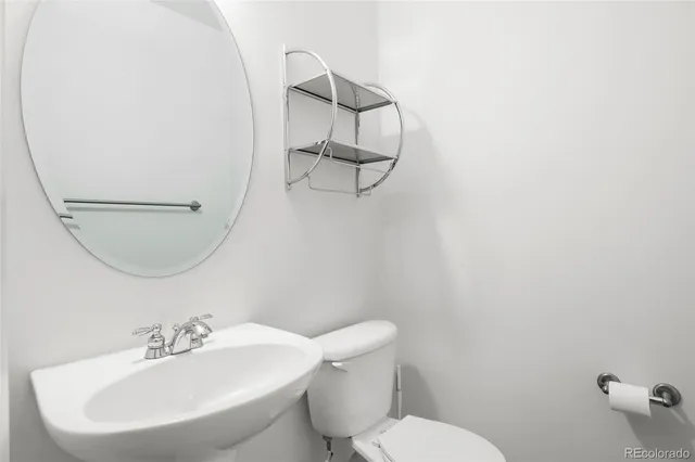 front view of a building with a bench