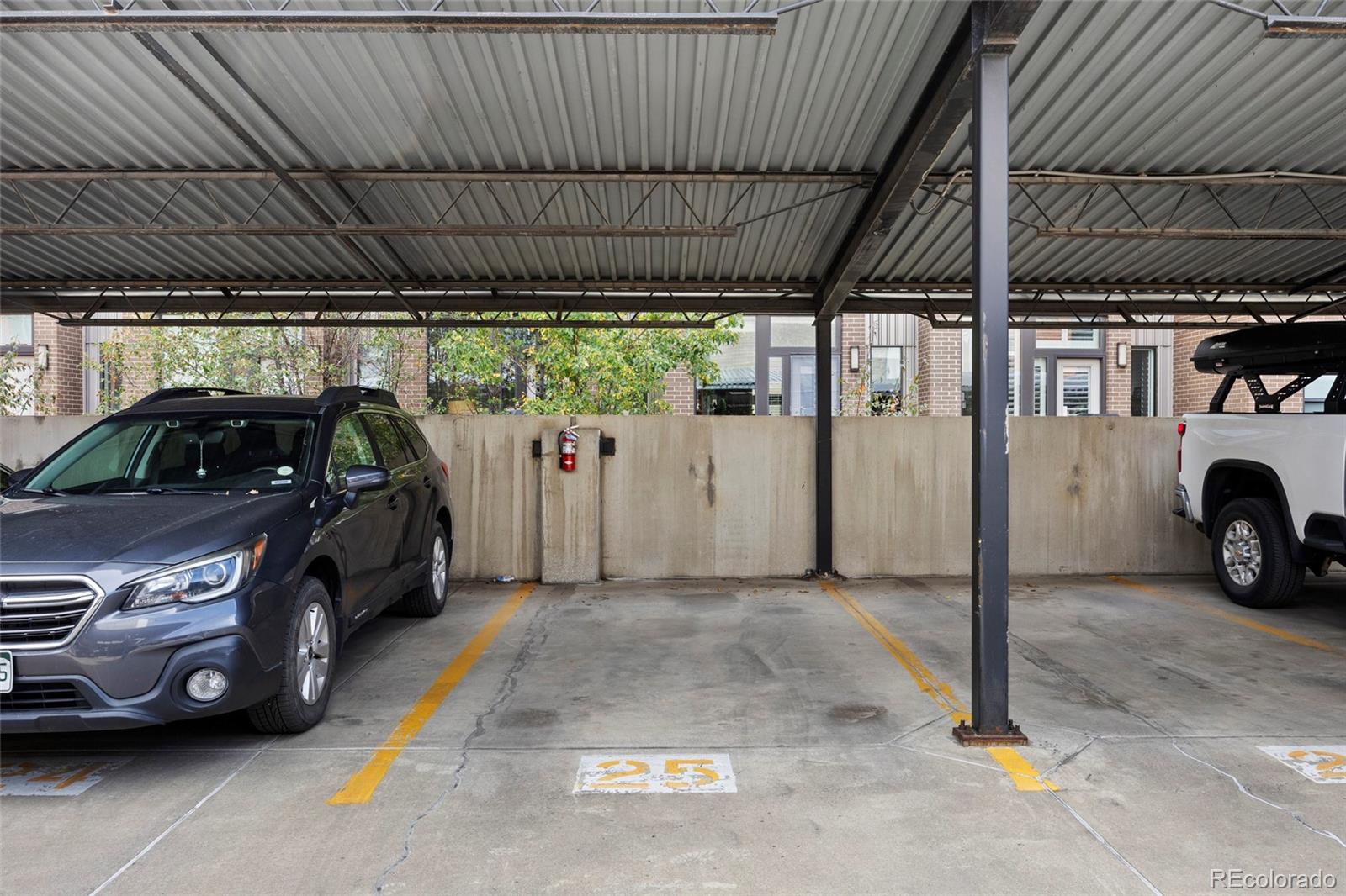 2960 Inca Street, Unit 208 Denver, CO 80202 - Photo 36 of 43 a car parked in garage