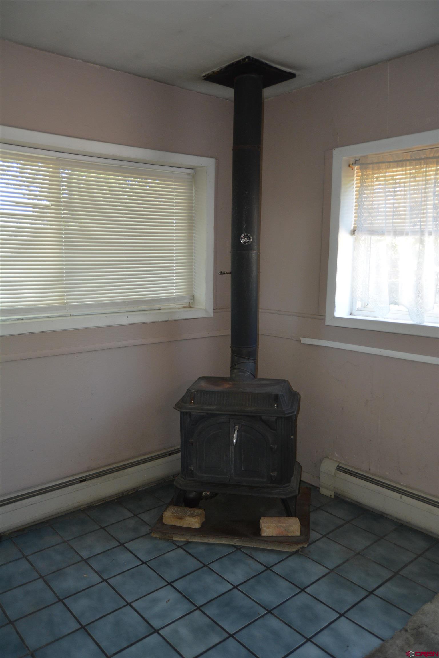 760 1575th Road Delta, CO 81416 - Photo 19 of 27 a room with a lamp and window