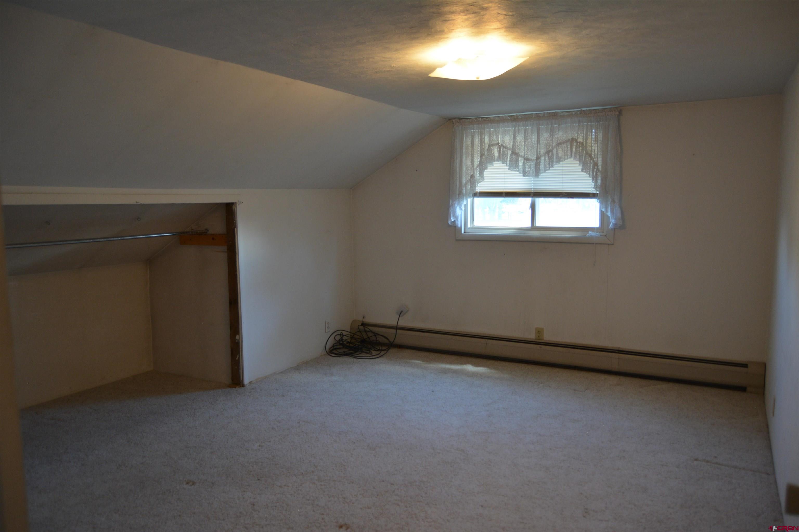 760 1575th Road Delta, CO 81416 - Photo 10 of 27 an empty room with a window