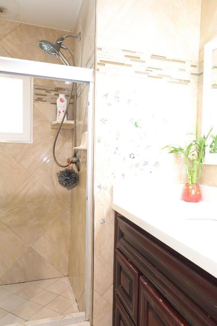 191 East El Camino Real, Unit 138 Mountain View, CA 94040 - Photo 13 of 23 a bathroom with a shower and a sink