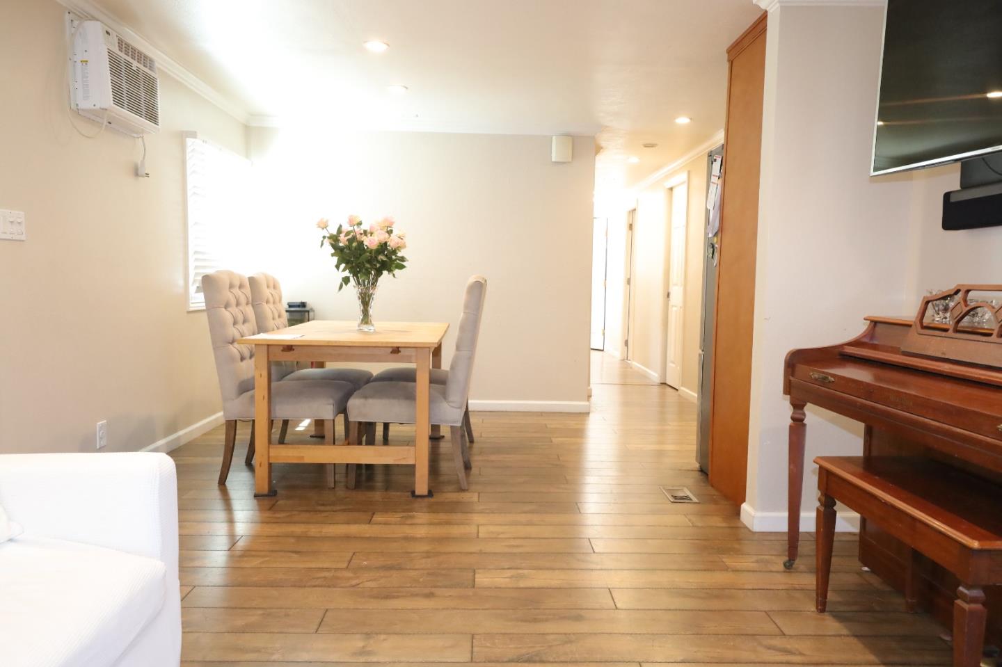 191 East El Camino Real, Unit 138 Mountain View, CA 94040 - Photo 20 of 23 a dining room with furniture and wooden floor