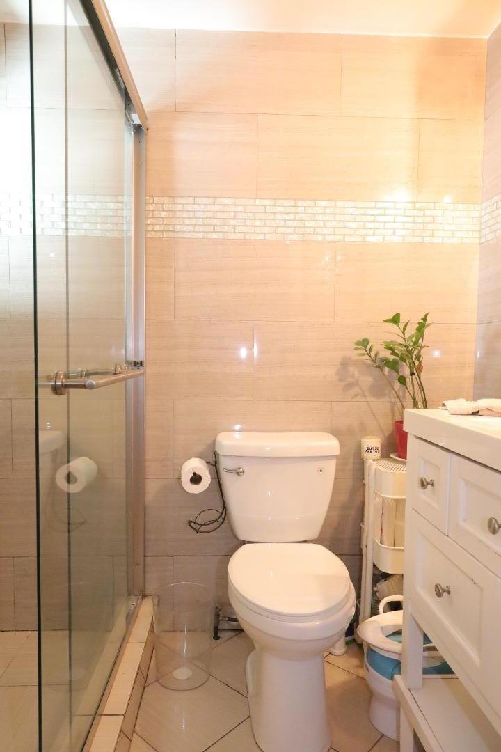 191 East El Camino Real, Unit 138 Mountain View, CA 94040 - Photo 5 of 23 a bathroom with a toilet and a shower