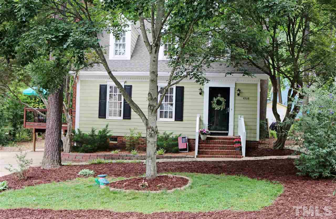 4508 Tetbury Place Raleigh, NC 27613 - Photo 1 of 22 a front view of a house with a yard