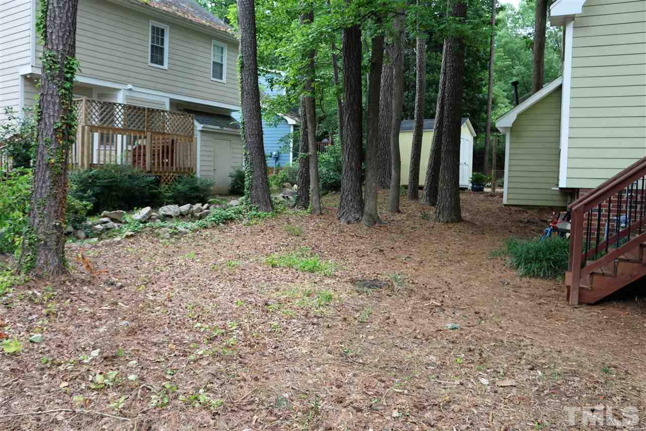 4508 Tetbury Place Raleigh, NC 27613 - Photo 3 of 22 a view of a house with backyard and garden