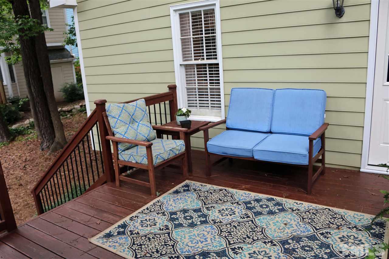 4508 Tetbury Place Raleigh, NC 27613 - Photo 5 of 22 a view of a two chairs in the balcony