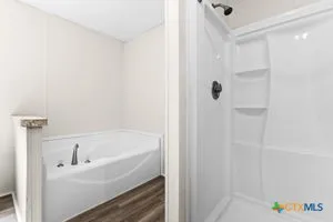 a bathroom with a white bath tub