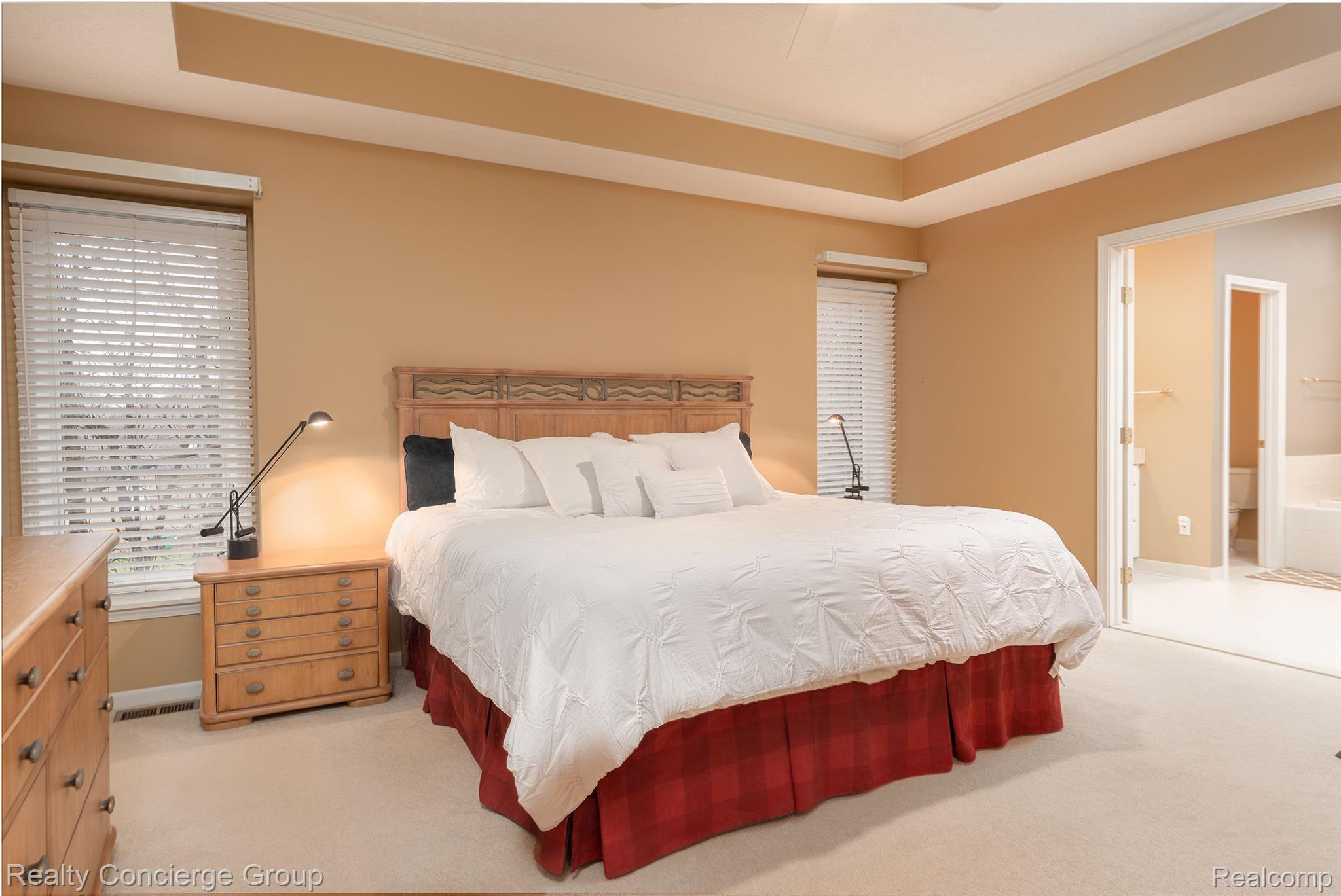 9514 Quail Ridge Run Brighton, MI 48114 - Photo 10 of 37 Main floor master suite is a spacious retreat