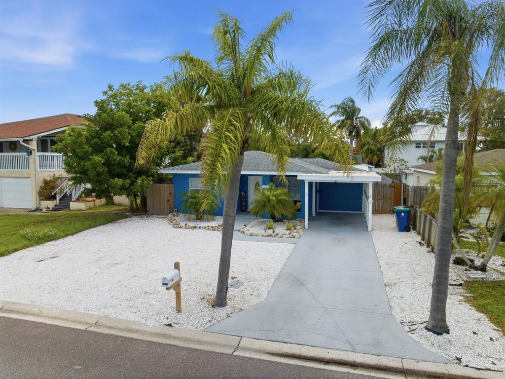 1207 1st Street Indian Rocks Beach, FL 33785 - Photo 42 of 60 a view of a house with a patio