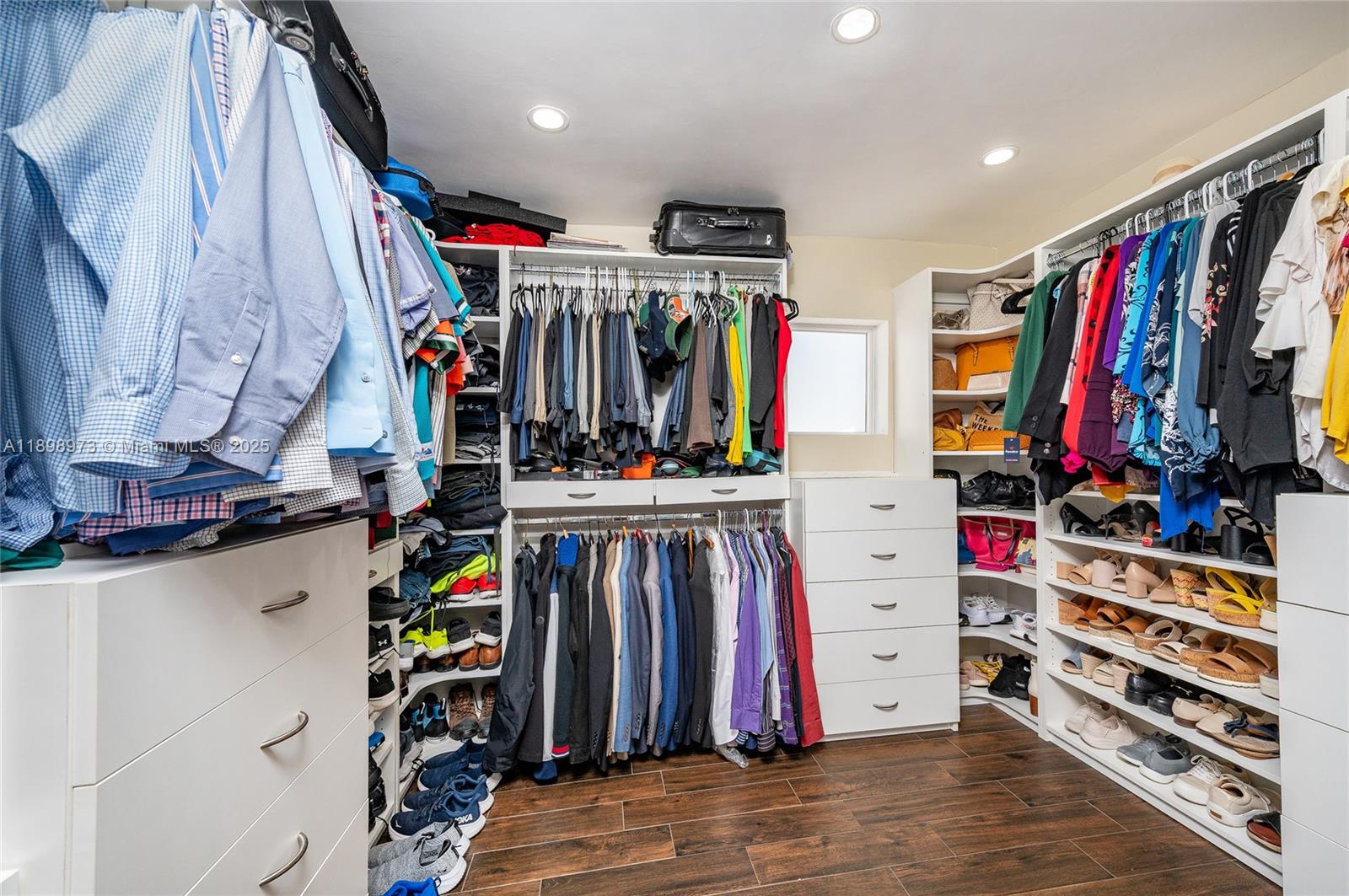 10341 Southwest 52nd Terrace Miami, FL 33165 - Photo 25 of 32 a view of walk in closet with clothes