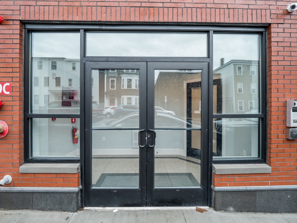 45 L Street, Unit 2 Boston, MA 02127 - Photo 24 of 31 a front view of a house with a porch