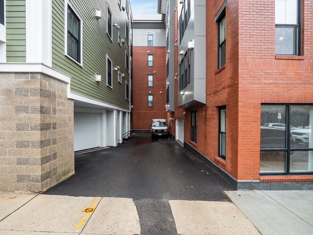 45 L Street, Unit 2 Boston, MA 02127 - Photo 26 of 31 a view of a building with a street