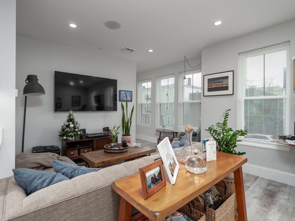 45 L Street, Unit 2 Boston, MA 02127 - Photo 5 of 31 a living room with furniture and a flat screen tv