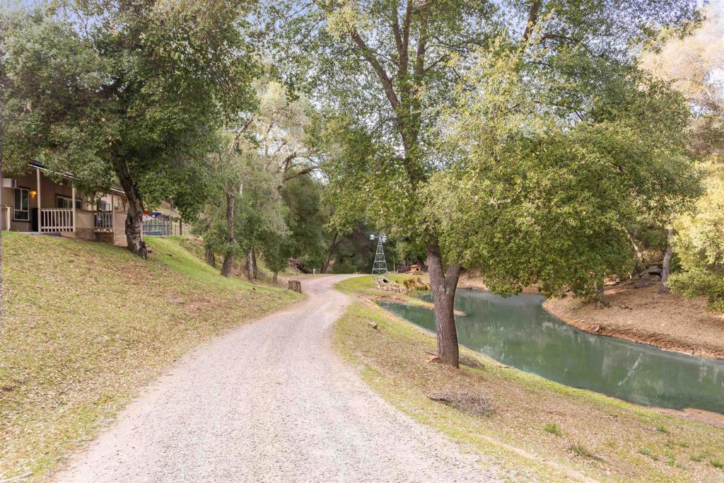 26352 Eagle Gap Road Santa Ysabel, CA 92070 - Photo 20 of 52 a view of a swimming pool with a yard