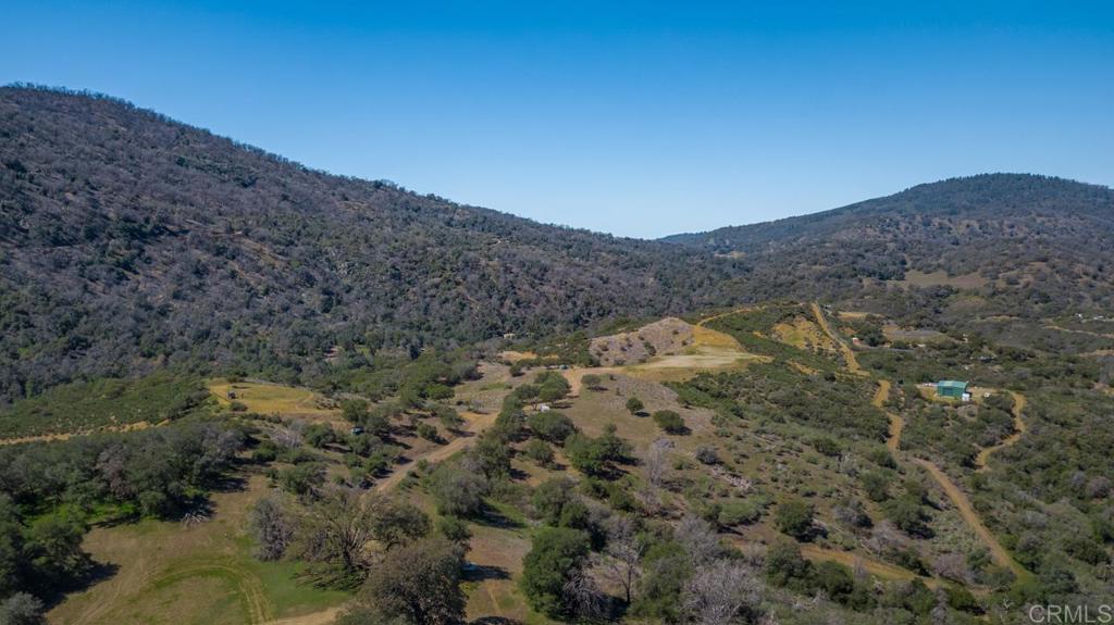 26352 Eagle Gap Road Santa Ysabel, CA 92070 - Photo 43 of 52 a view of a dry yard with mountains in the background