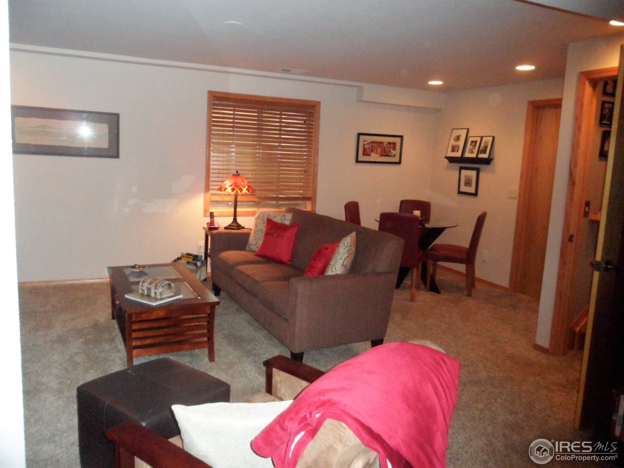 724 Wade Road Longmont, CO 80503 - Photo 21 of 32 a living room with furniture