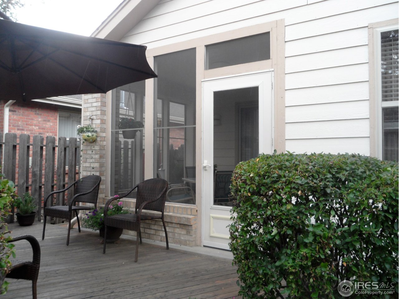 724 Wade Road Longmont, CO 80503 - Photo 27 of 32 a view of backyard with outdoor seating and plants