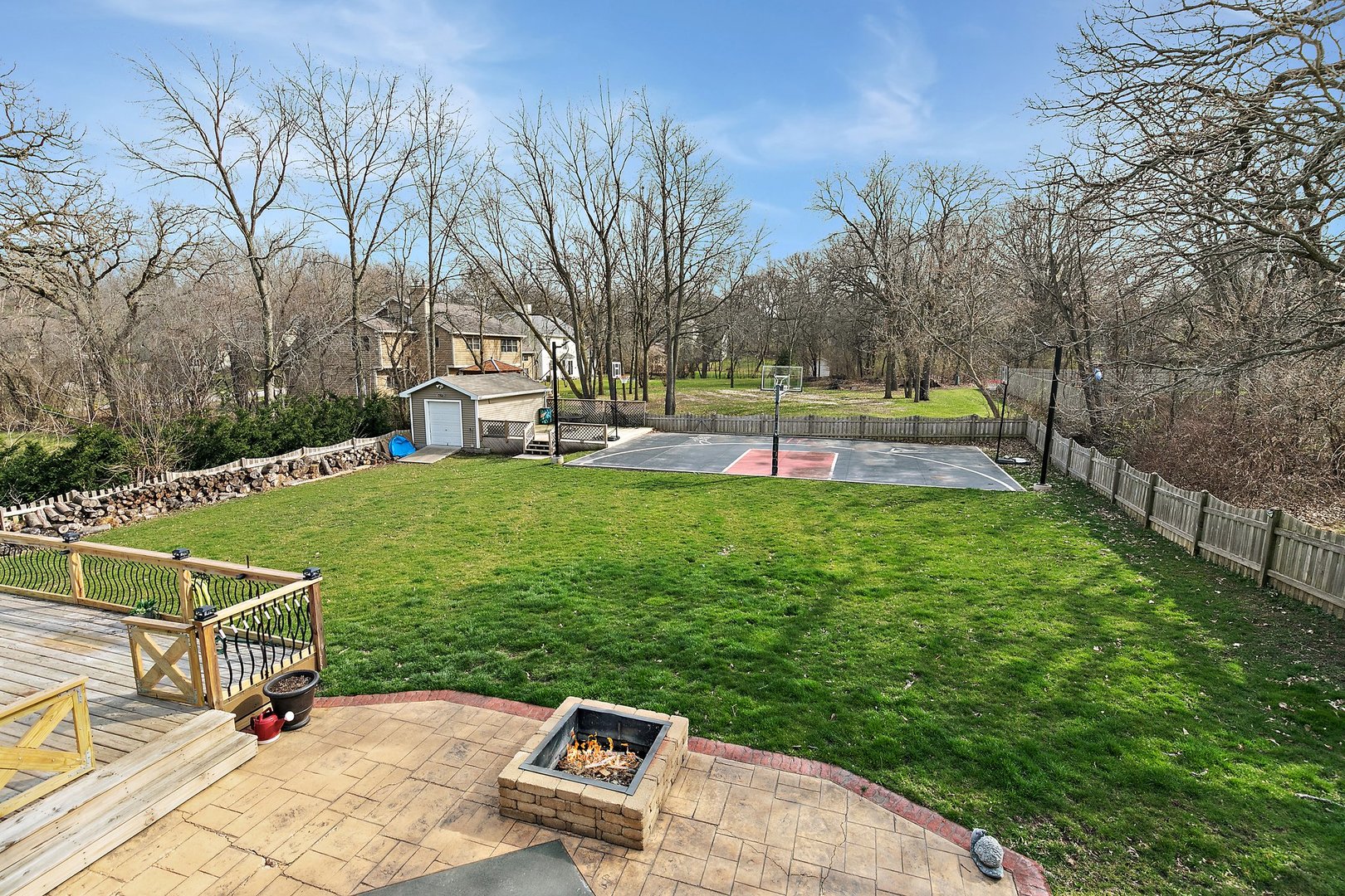 8911 Burton Road Wonder Lake, IL 60097 - Photo 30 of 35 a view of a backyard with a garden