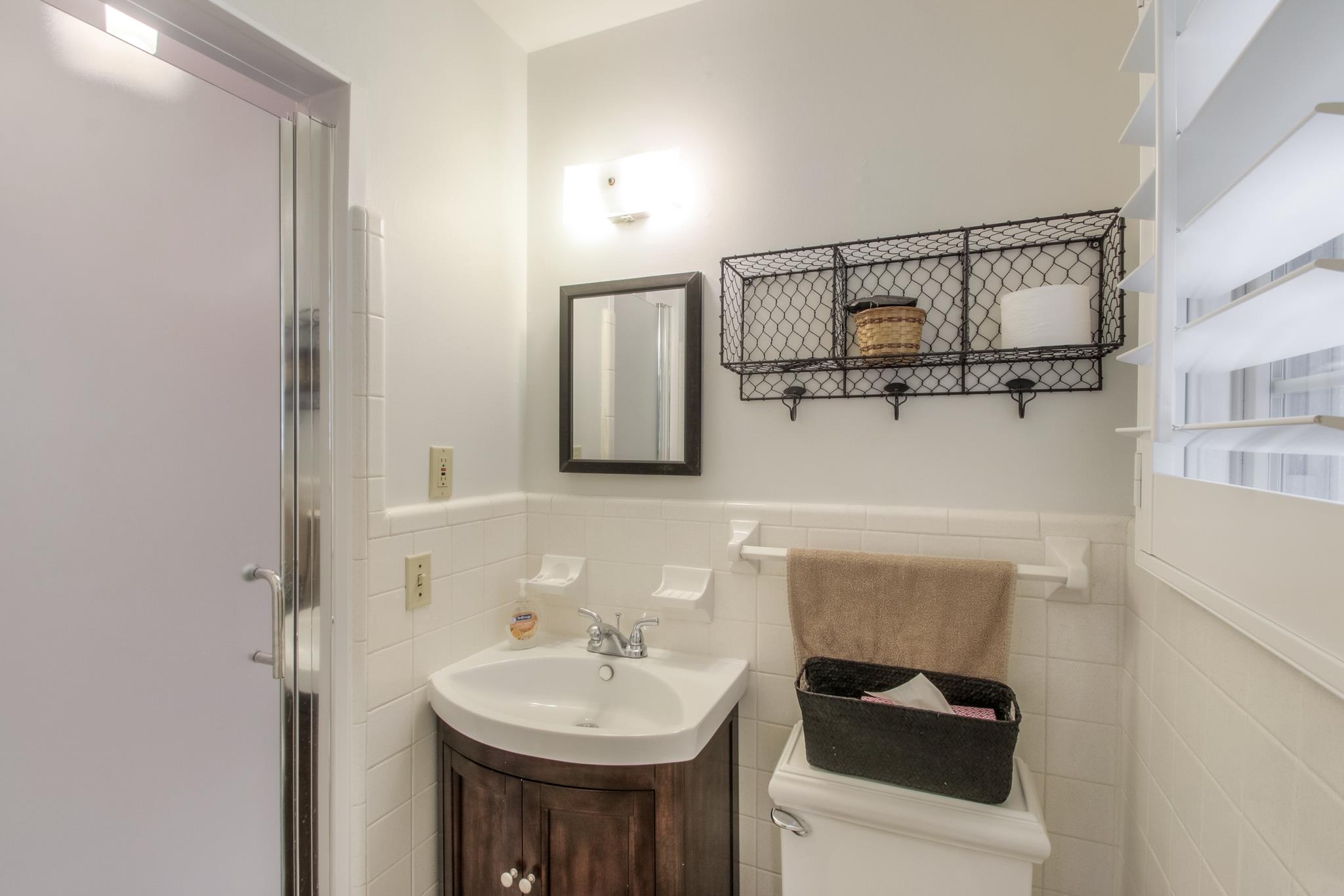 1160 Vanderbilt Road Mount Juliet, TN 37122 - Photo 13 of 28 a bathroom with a sink and a mirror