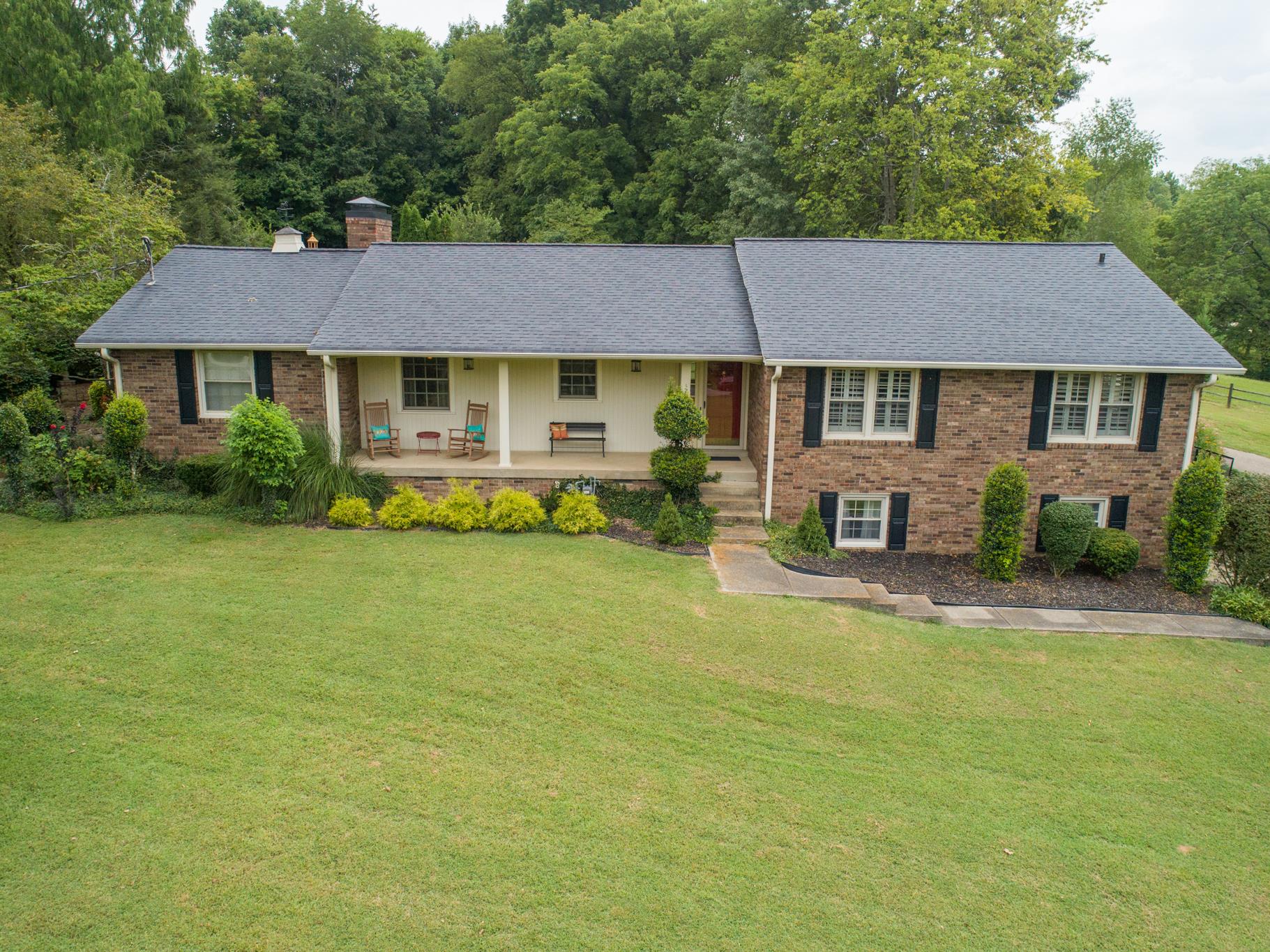 1160 Vanderbilt Road Mount Juliet, TN 37122 - Photo 3 of 28 a front view of a house with garden