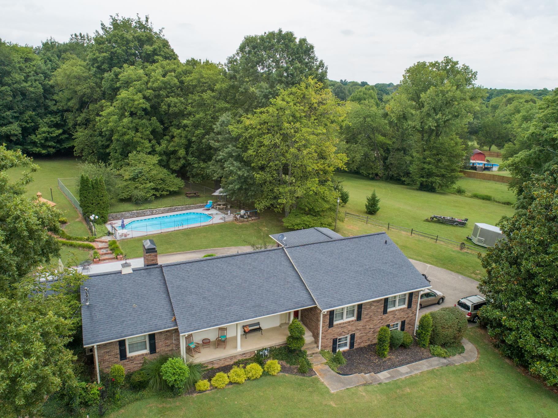 1160 Vanderbilt Road Mount Juliet, TN 37122 - Photo 4 of 28 an aerial view of a house with swimming pool garden and outdoor seating