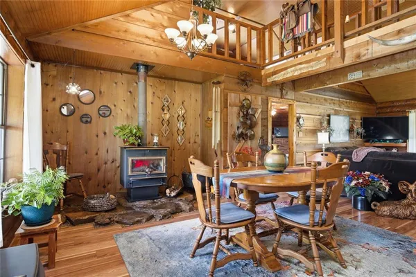 a outdoor dining space with furniture and outdoor view
