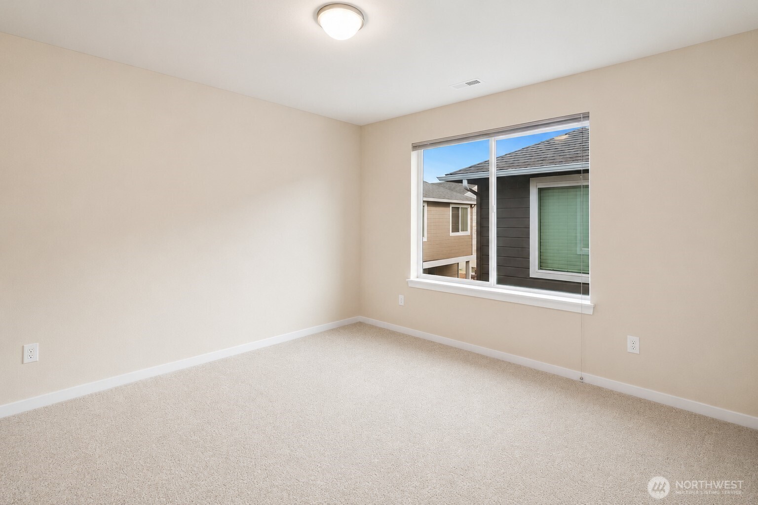 17227 39th Drive Southeast Bothell, WA 98012 - Photo 14 of 22 a view of an empty room with a window