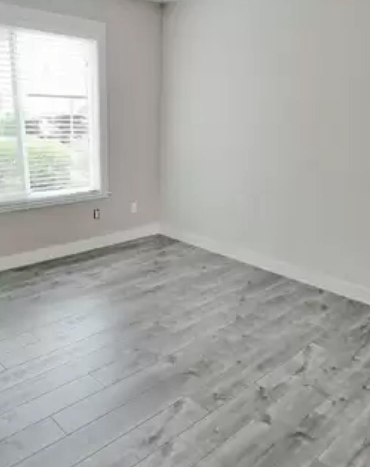 215 Reflections Drive, Unit 15 San Ramon, CA 94583 - Photo 8 of 14 an empty room with a window