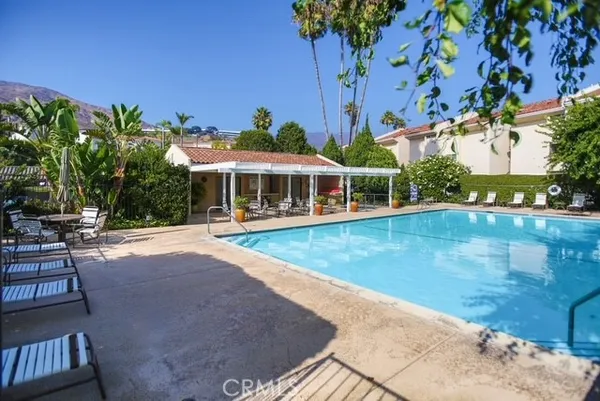 swimming pool with outdoor seating