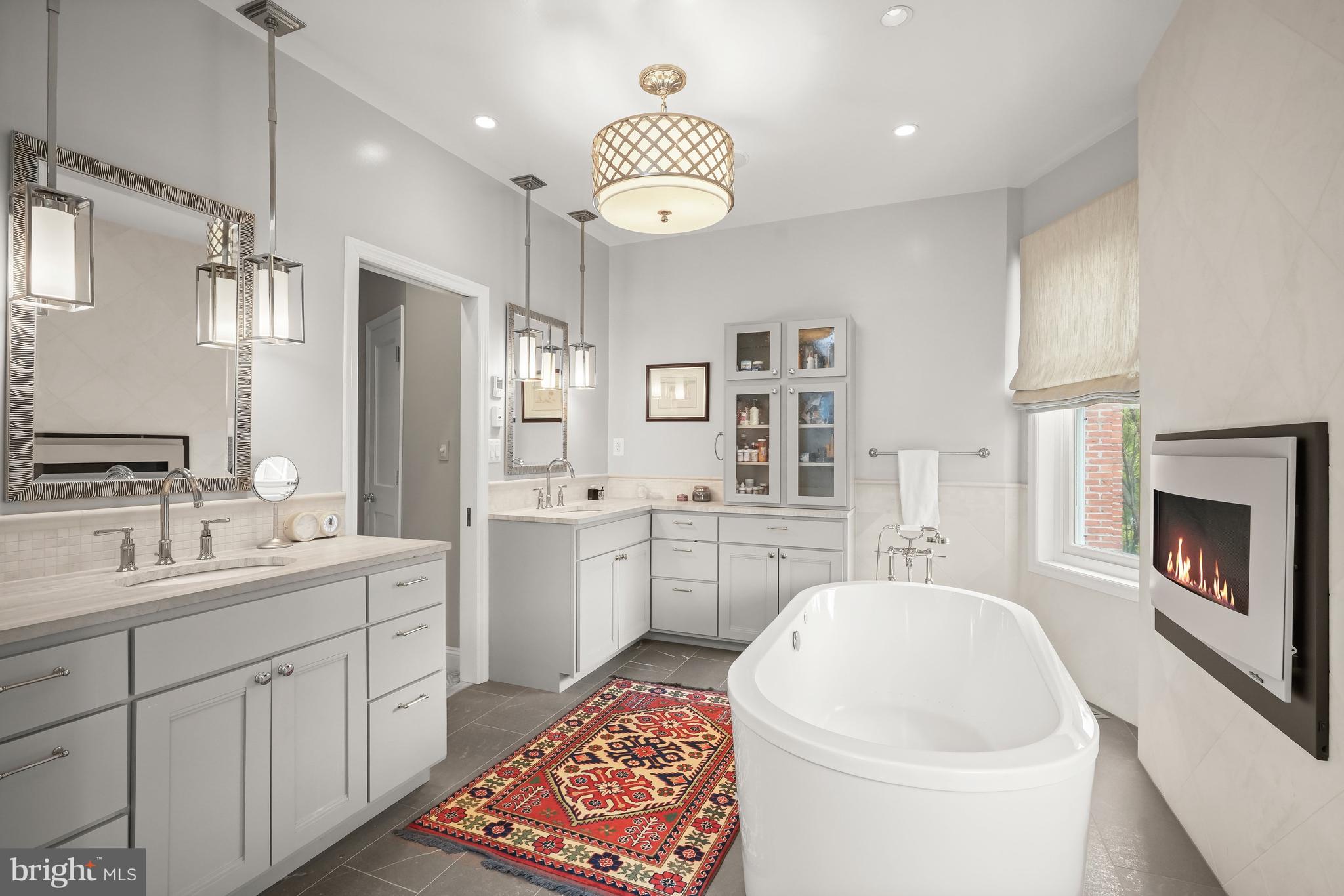 1716 Q Street Northwest Washington, DC 20009 - Photo 22 of 47 Primary Bathroom with fireplace