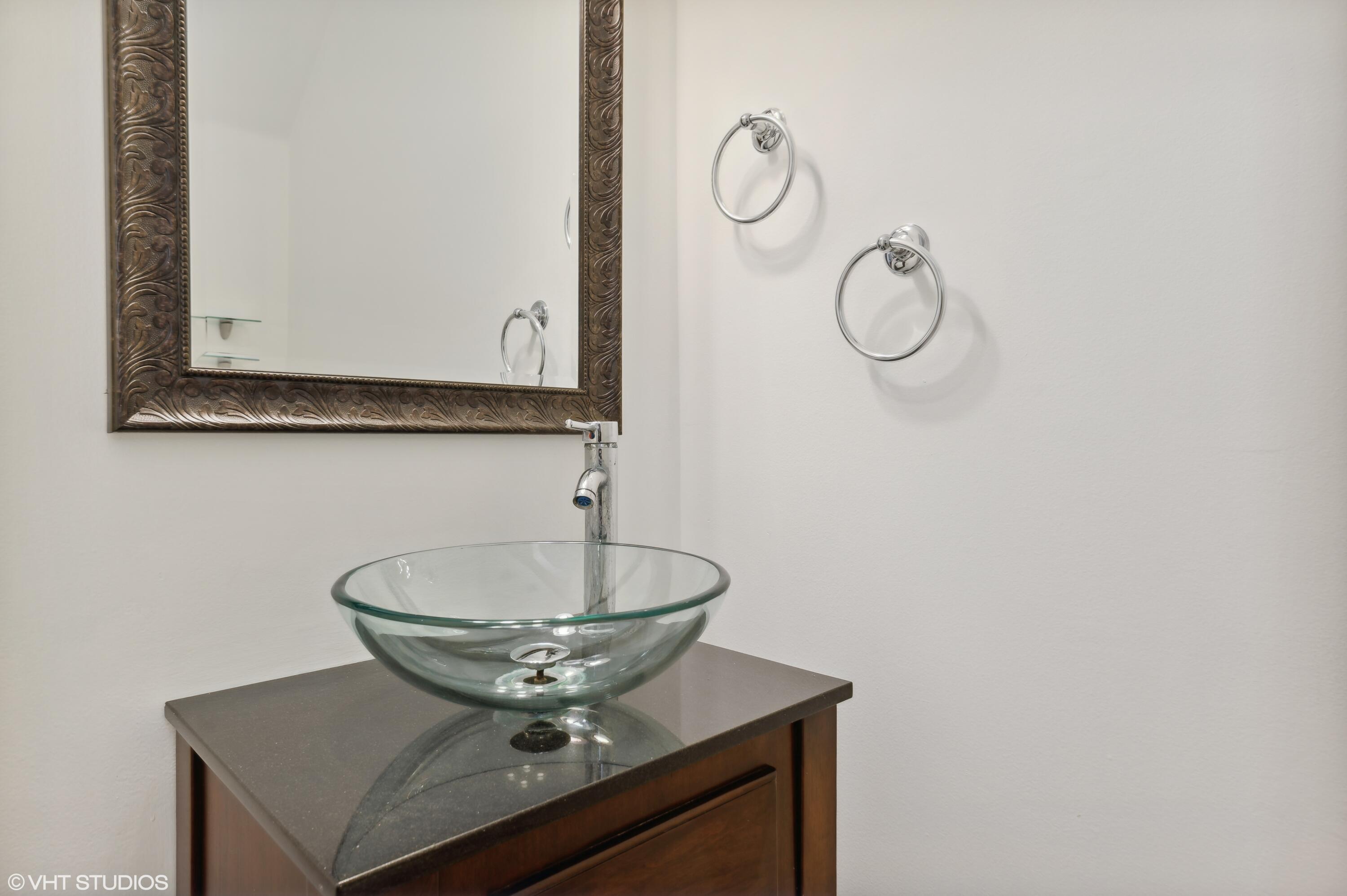 103 Lighthouse Circle, Unit D Tequesta, FL 33469 - Photo 29 of 36 HALF BATH ON MAIN LEVEL