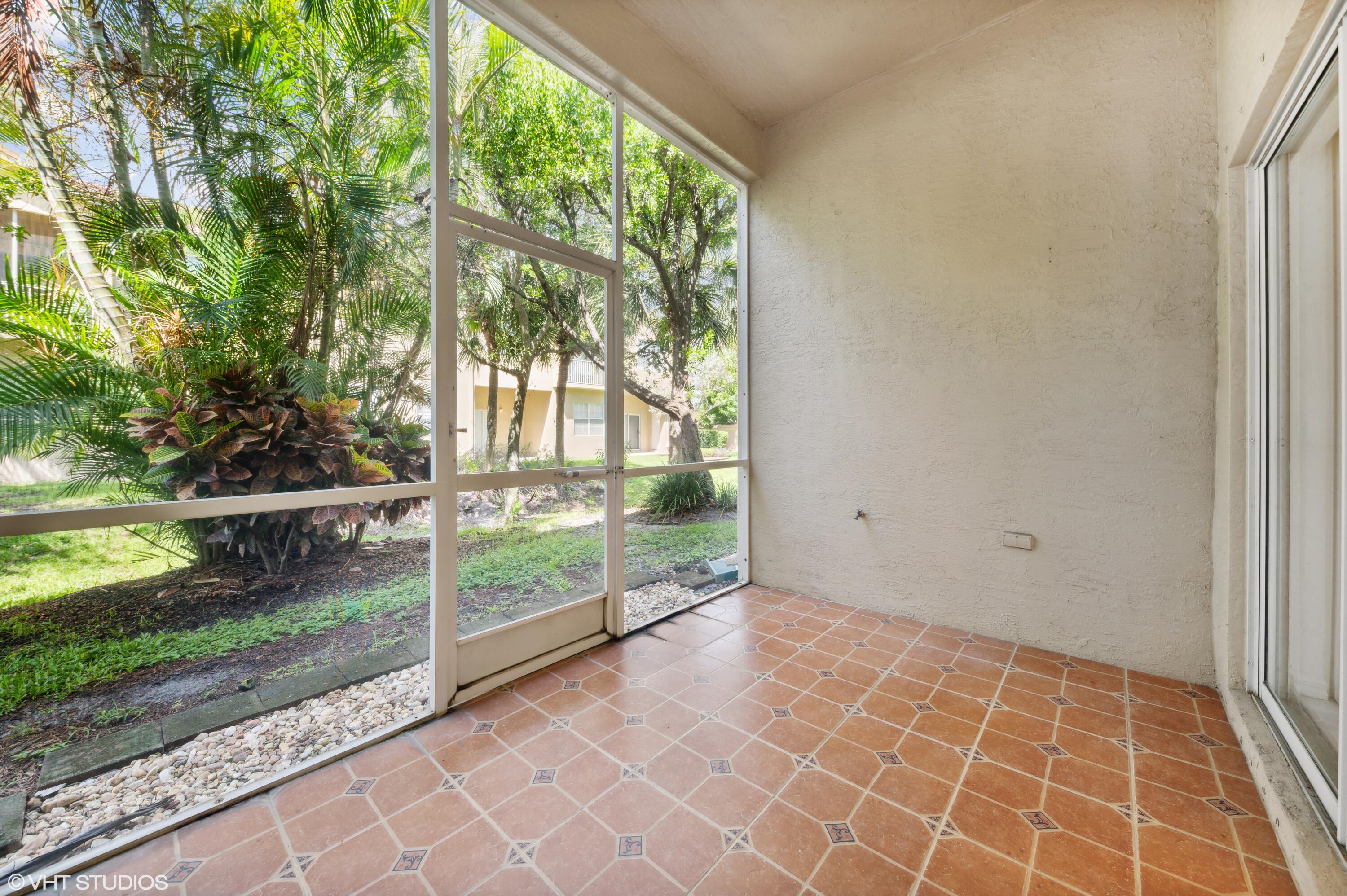 103 Lighthouse Circle, Unit D Tequesta, FL 33469 - Photo 31 of 36 SCREENED LANAI