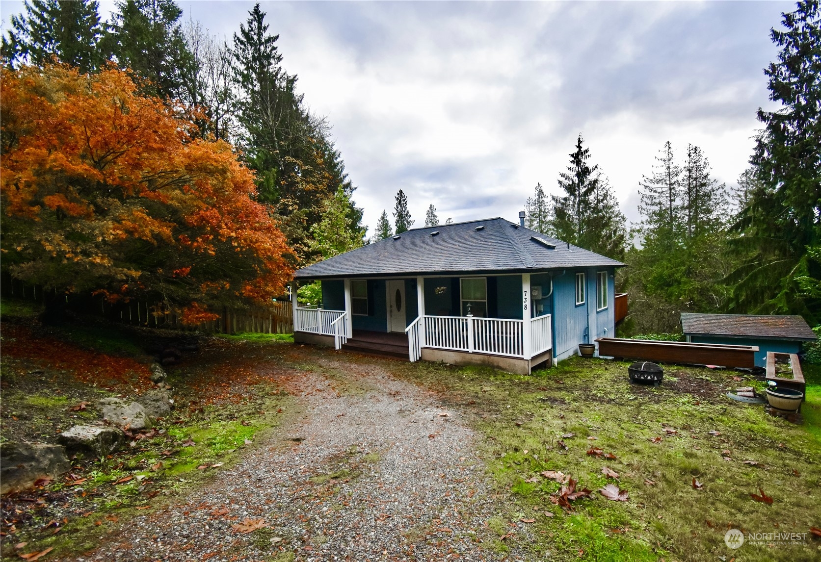 738 W Road Sedro-Woolley, WA 98284 - Photo 1 of 17 a view of a house with a yard and sitting area