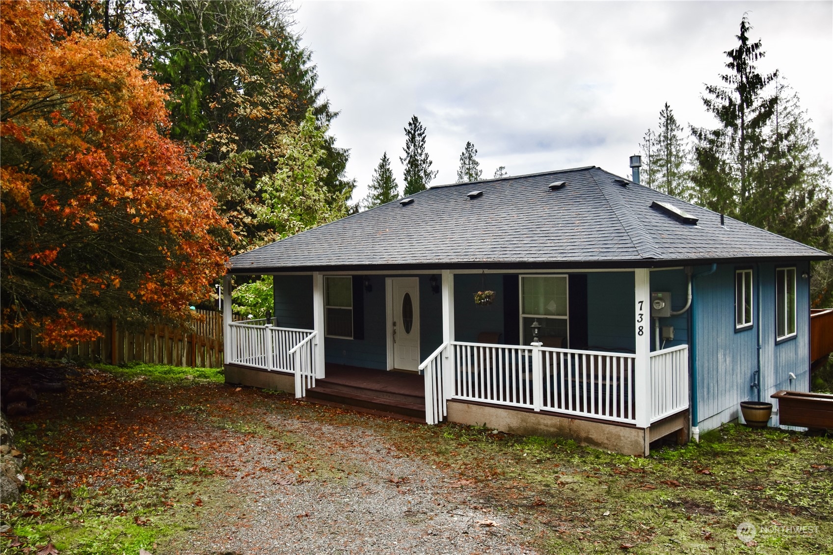 738 W Road Sedro-Woolley, WA 98284 - Photo 2 of 17 a view of a house with a yard and fence