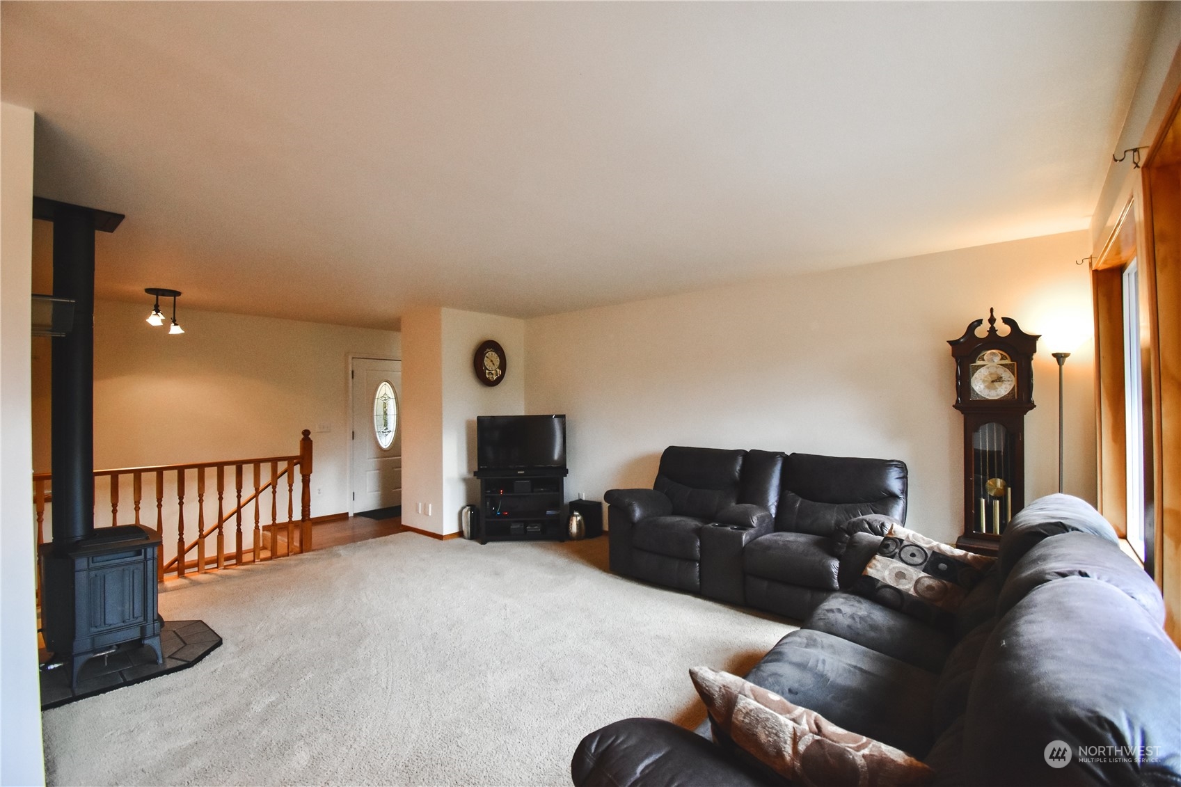 738 W Road Sedro-Woolley, WA 98284 - Photo 3 of 17 a living room with furniture and a flat screen tv