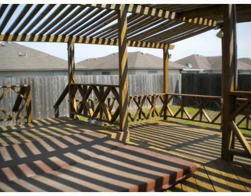 a view of a balcony with street sign