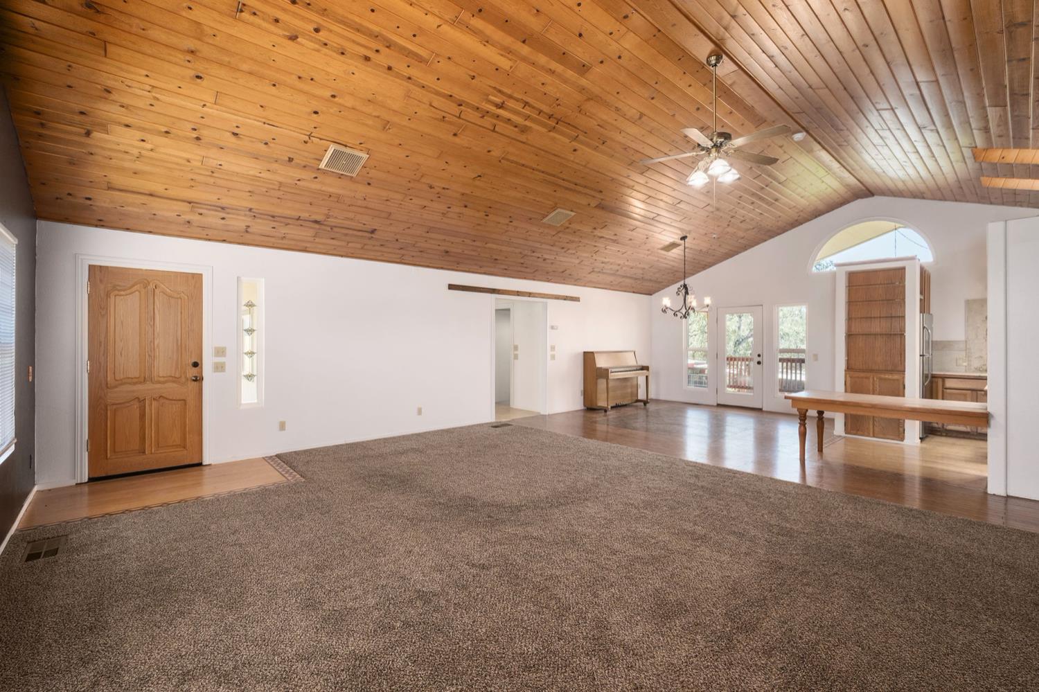 37667 Eagle Drive Raymond, CA 93653 - Photo 8 of 43 a view of empty room with wooden floor