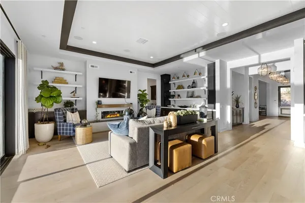a view of living room with furniture and flat screen tv