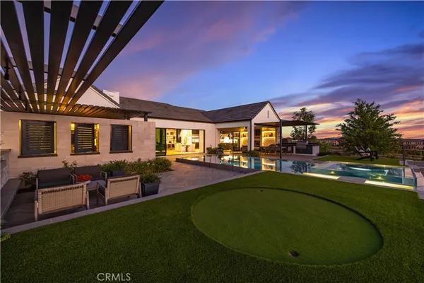 a view of a house with swimming pool