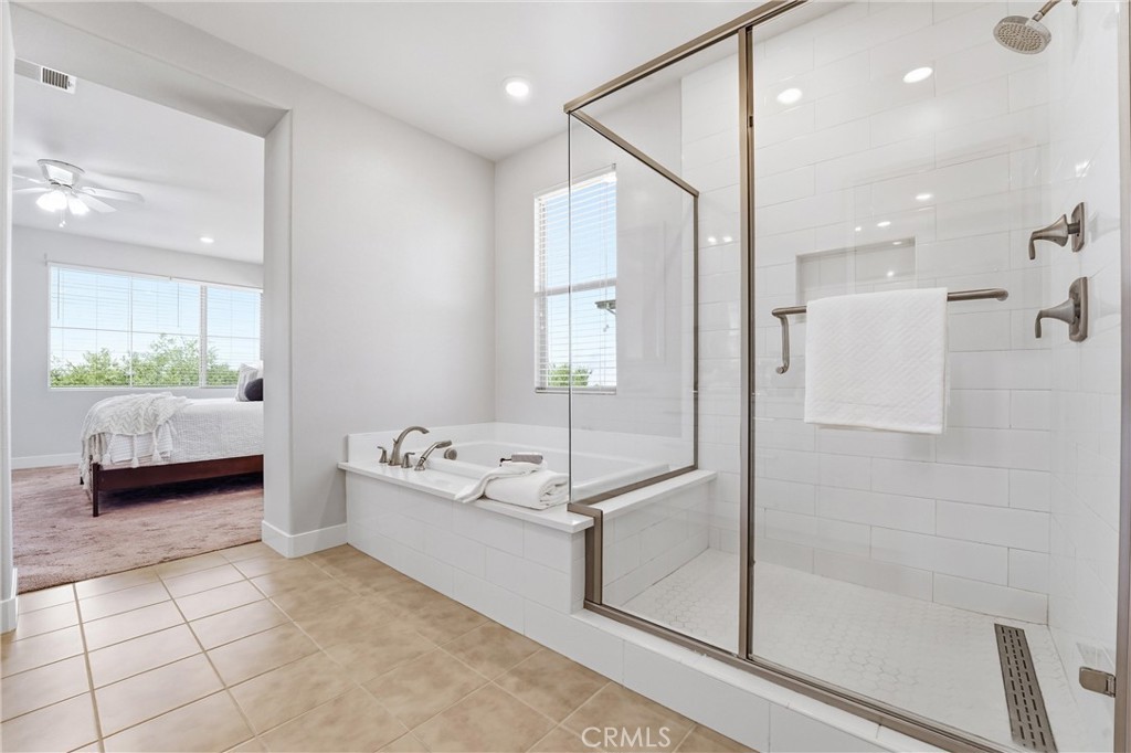 182 Scale Irvine, CA 92618 - Photo 33 of 61 Three body sprays, a rain head, subway tile, and a linear drain. This shower is not a compromise.