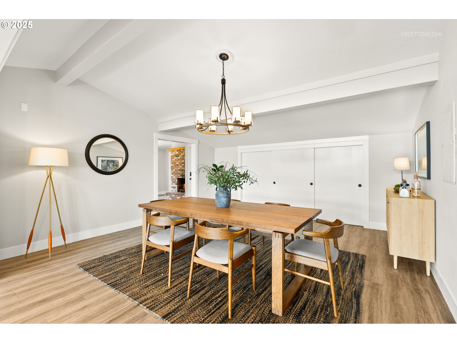 22645 Southwest Chapman Road Sherwood, OR 97140 - Photo 12 of 48 a dining room with furniture and a chandelier