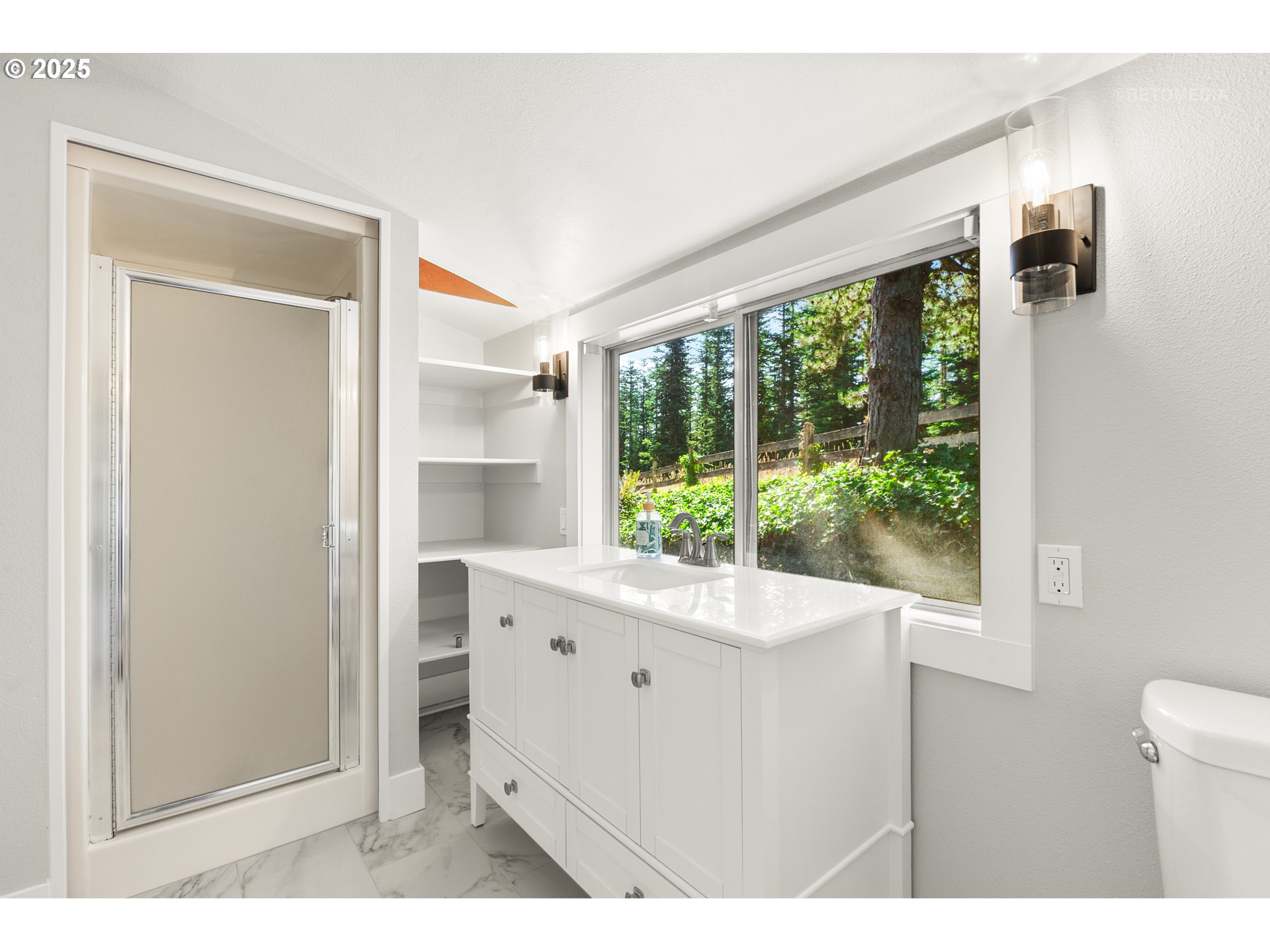 22645 Southwest Chapman Road Sherwood, OR 97140 - Photo 24 of 48 a kitchen with a sink and a large mirror
