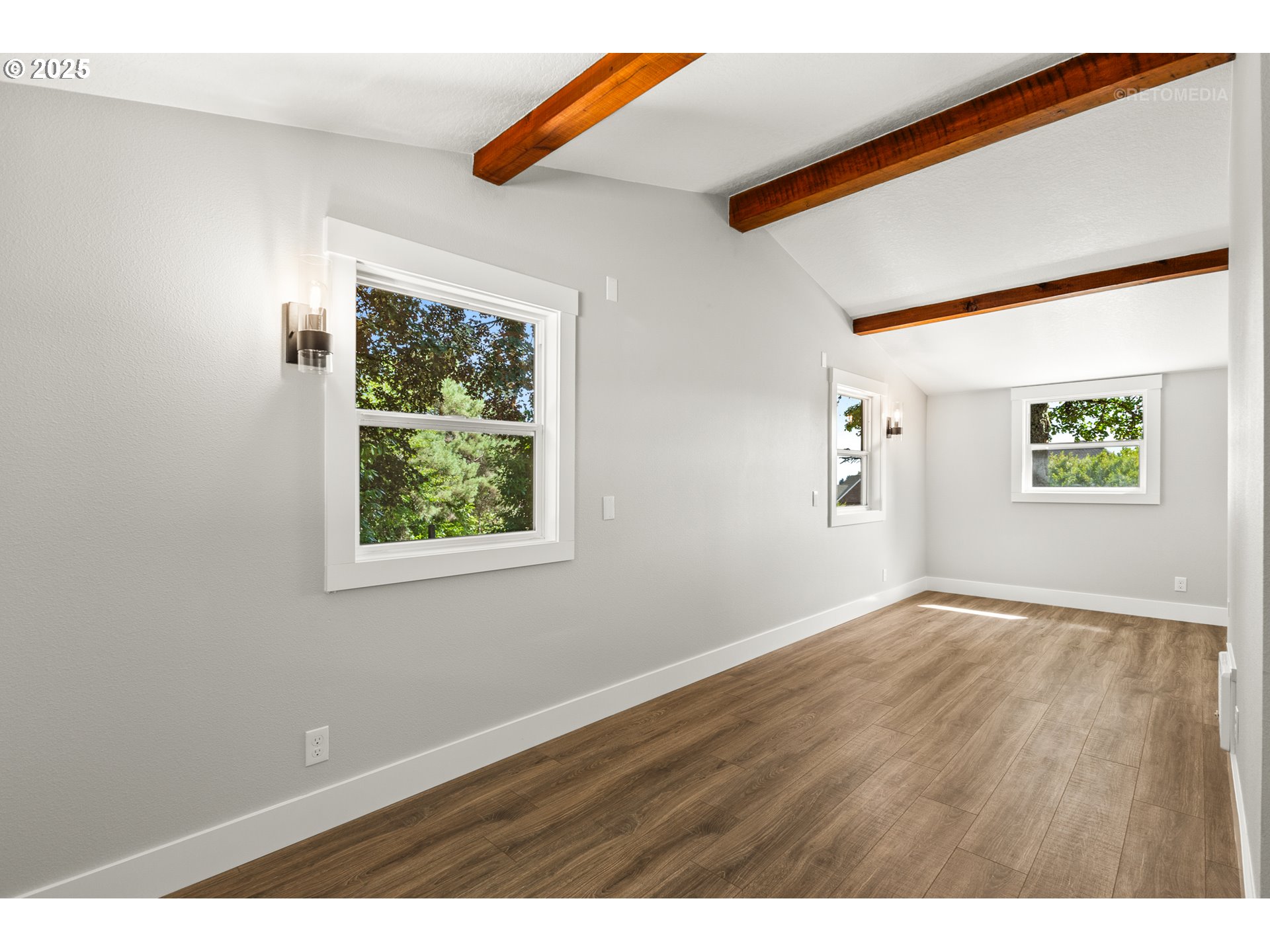 22645 Southwest Chapman Road Sherwood, OR 97140 - Photo 25 of 48 an empty room with wooden floor and windows